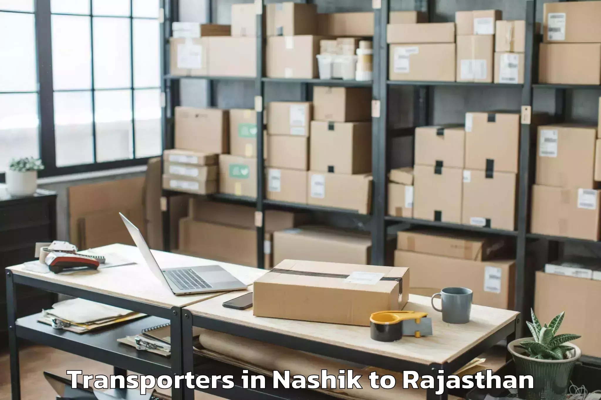 Leading Nashik to Bari Sadri Transporters Provider